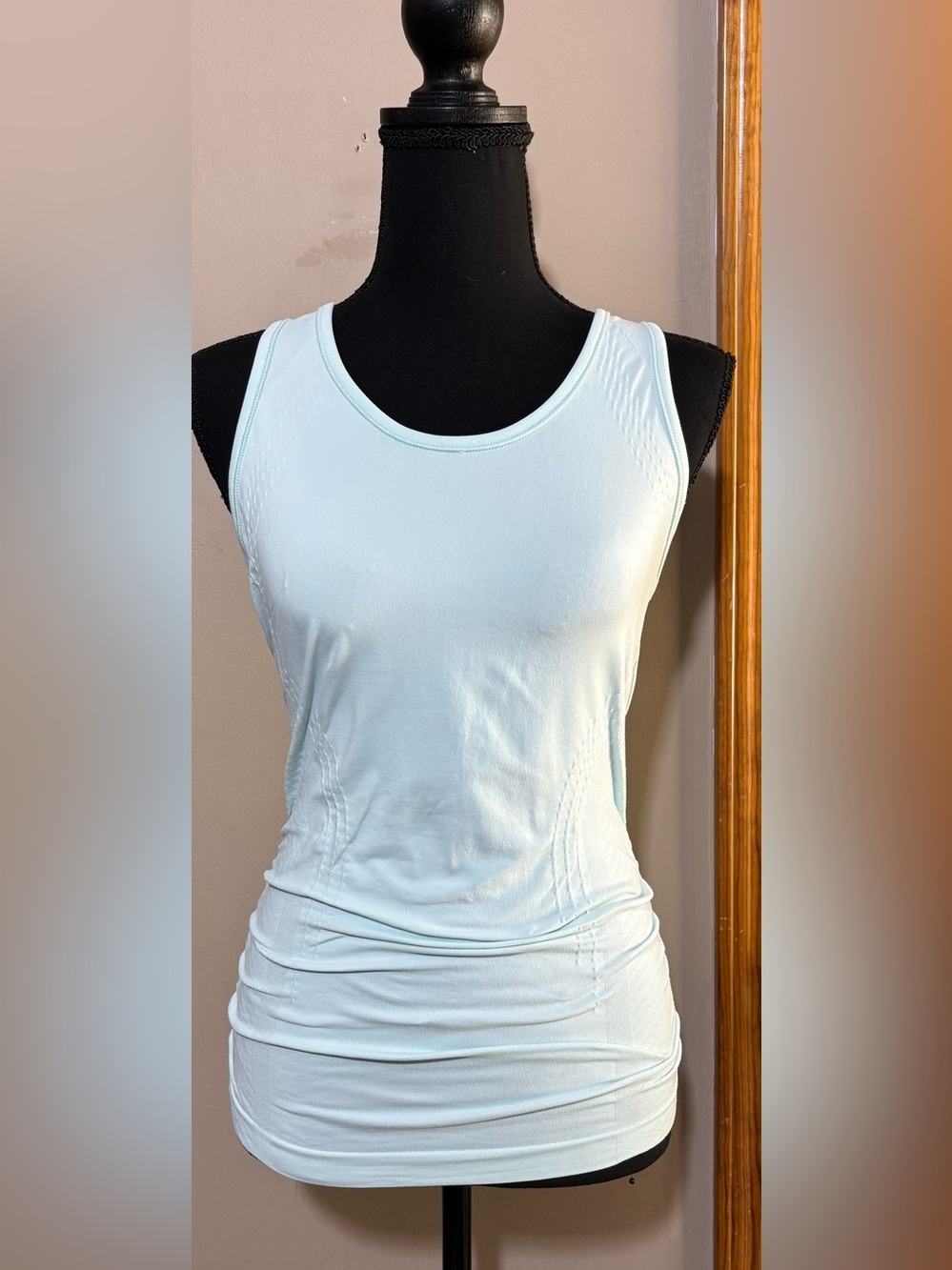 Athleta light mint green seamless racerback tank top size S. With ruched sides